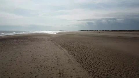 Beautiful sandy beach, sun beaming down on the ocean, 4K" Stock Footage 212161789