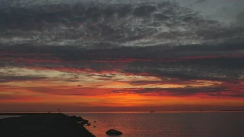 Beautiful scene of dramatic sky sunset on the sea Stock Footage 138329557