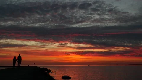 Beautiful scene of dramatic sky sunset on the sea Stock Footage 138962728