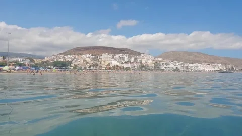 Beautiful scenery at Playa de las Vistas in Tenerife Canary Islands with Stock Footage 249309760