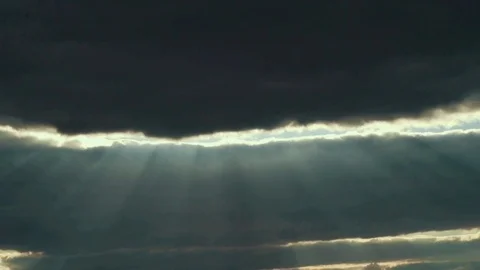 Beautiful scenery rays sun shine through cloudsin summer sky Stock Footage 82010476