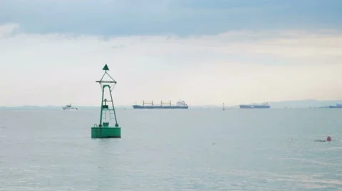 Beautiful scenery: small waves of the Pacific Ocean, a large ship in the Stock Footage 67610530