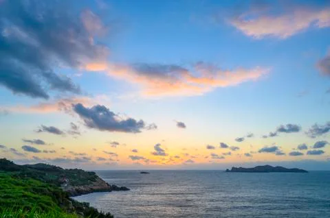 Beautiful scenery of sunrise by the sea Stock Photos