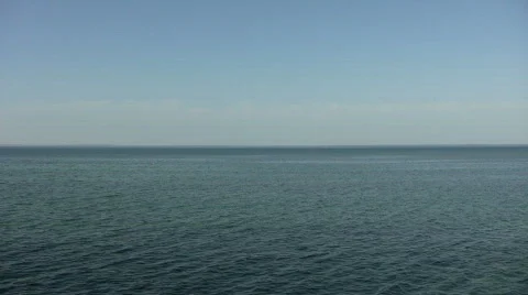 Beautiful scenic of calm blue water (High Definition) Stock Footage