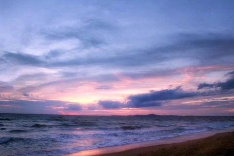 Beautiful sea landscape with dramatic sunset sky. Stock Photos