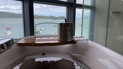 Beautiful sea ocean view while relaxing in bathtub Stock Footage 243063675