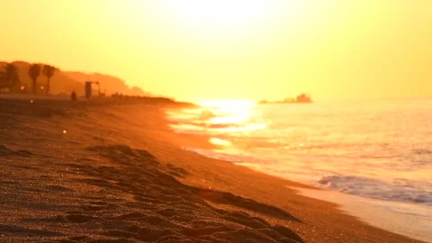 Beautiful sea side view, summer beach in sunrise lights, waves. Coast line Stock Footage 325375643