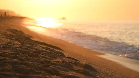 Beautiful sea side view, summer beach in sunrise lights, waves. Beach Stock Footage 336528924