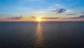 The beautiful sea on the sunset background. quadrocopter shot, time lapse 4k or 4k+ Resolution