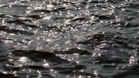 Beautiful sea view. Sun glare glistening and shimmering on the wavy water surfac Stock Footage 111246653