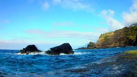 Beautiful sea view wave break crash and explosion on volcanic rocks Stock Footage 112972147