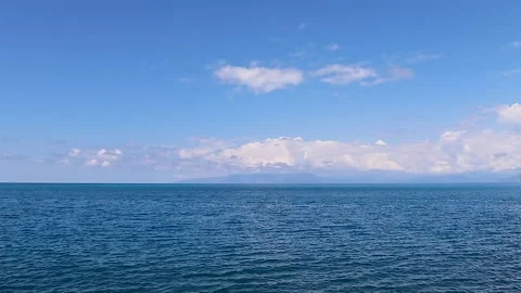 Beautiful Sea Waves. Pebble, Clean Beach and Amazing Sea. Travel Concept Stock Footage 246382642