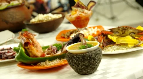 Beautiful seafood selection spread out on table with camera sliding past Stock Footage 57539655