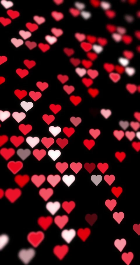 Beautiful seamless loop hearts pattern on black vertical background Stock Footage 347687657