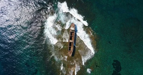 Beautiful seascape with old big, broken, rusty boat near the coast of Peyia, Stock Footage 76668043