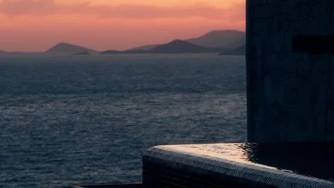 Beautiful seaside infinity pool and romantic sunset, Turkey Stock Photos