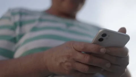 Beautiful senior lady using smartphone. older people and modern tech concept. Stock Footage 163333898