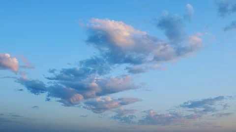 A Beautiful Serene Cloudscape at Dusk with a Soft Blue Sky That Evokes Peacefuln Video stock 317229307