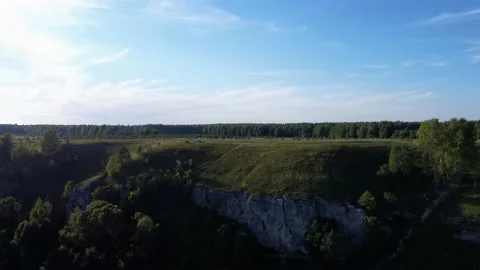 Beautiful serial over the rocks above the bank of a winding river Stock Footage 159155698
