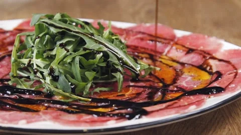 Beautiful serving of carpaccio at the restaurant. Stock Footage 131408413