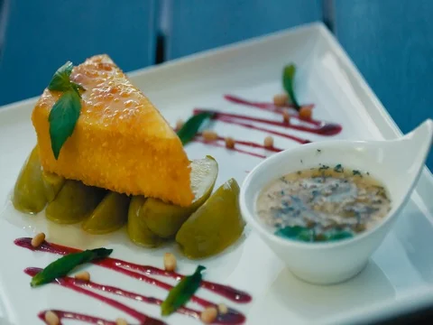 Beautiful serving dishes. Dessert Serving Mint Leaf Stock Footage 77055697