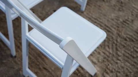 A Beautiful Set of Elegant White Chairs Perfectly Designed for Outdoor Event Stock Footage 314577125