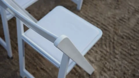 A Beautiful Set of Elegant White Chairs Perfectly Designed for Outdoor Event Stock Footage 316511731