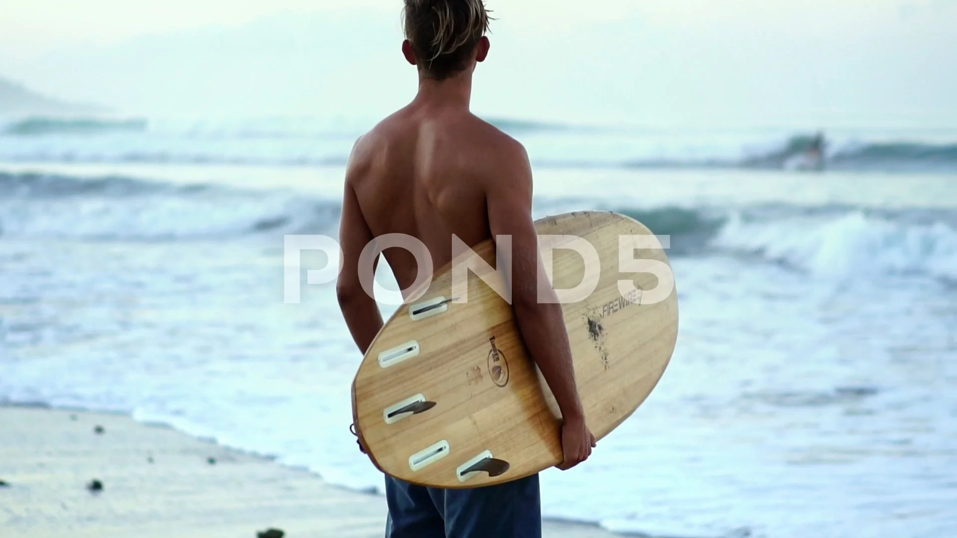 Beautiful sexy surfer guy on beach, summer surf adventure, slow motion, sea