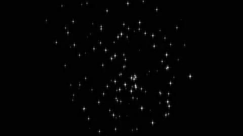 Beautiful shimmering particles on dark background, bright particles flying .. Stock Footage 223285629