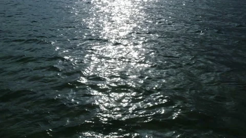 Beautiful shiny moon path on the surface of the sea. Aerial view over calm sea Stock Footage 158119637