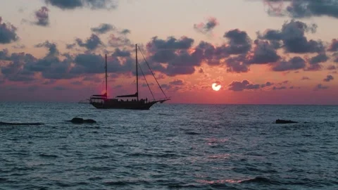 Beautiful ship at sunset over the ocean 50 fps Stock Footage 157590873