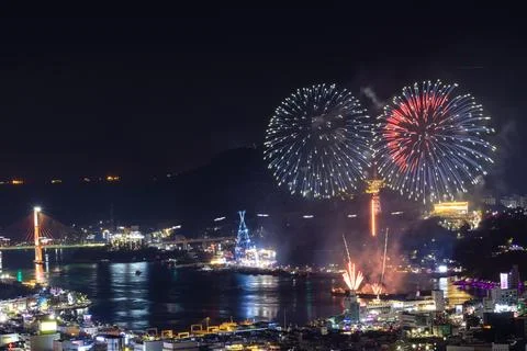 Beautiful shot of the exploding fireworks at the 2022 Yeosu Night Sea Fireworks Stock Photos