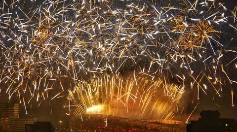 Beautiful shot of exploding gold fireworks in the sky Stock Photos