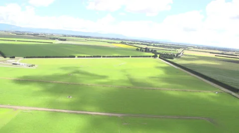 A beautiful shot of green fields and farms Stock Footage 34257688