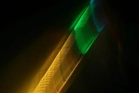 A beautiful shot of intersecting refracted green and yellow light layers on a Stock Illustration