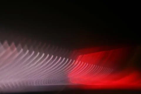 Beautiful shot of intersecting refracted red light layers on a black backgrou Stock Illustration