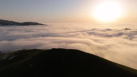 Beautiful shot in the mountains above the clouds during sunset Stock Footage 298532500