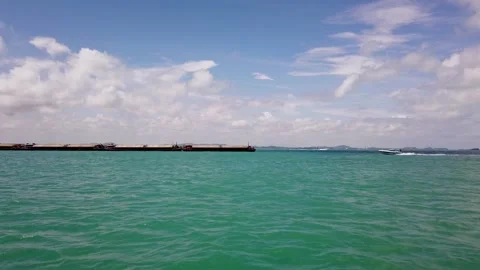 Beautiful  Shot of a Speed Boat Going Along the Horizon Stock Footage 148367684