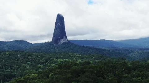 A beautiful side-angle drone shot of Pico Cão Grande on the paradise island of Stock Footage 346000209