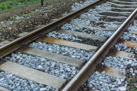 Beautiful side macro close up of a train railway track amazing transport or t Stock Photos