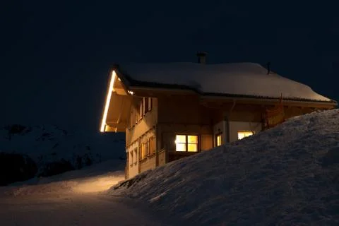 Beautiful skiing hut at  night Stock Photos