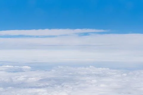 Beautiful sky above the clouds. Background of cloudy sky. Fotos Stock