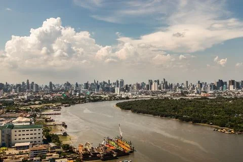 Beautiful sky and cloud view of Bangkok with skyscrapers along Chaopraya rive Stock Photos