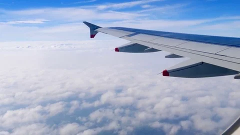 Beautiful sky and clouds view from the window of the plane 스톡 동영상 76087347