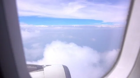 Beautiful sky blue and cloud from window of airplane Stock Footage 87752173