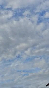 A Beautiful Sky with Cloud Formations and Blue Patche Stock Photos