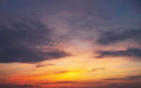 Beautiful sky with clouds during sunset or sunrise. Panoramic skyscape. Stock Photos