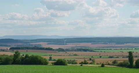 Beautiful sky clouds landscape panning with sunny beet field stock footage Stock Footage 135240924