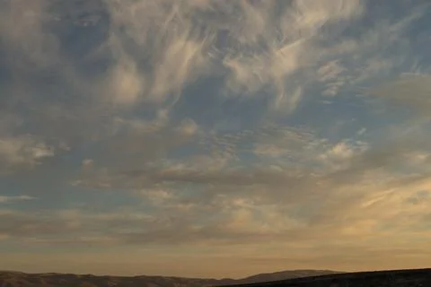Beautiful sky with clouds at sunset Stock Photos