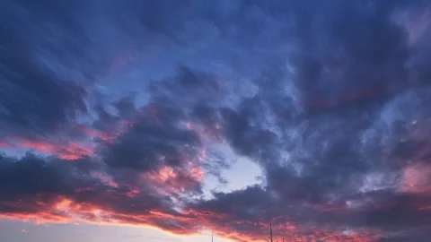 Beautiful sky clouds at sunset. Yellow sky and black clouds with sun nature Stock Footage 285624261